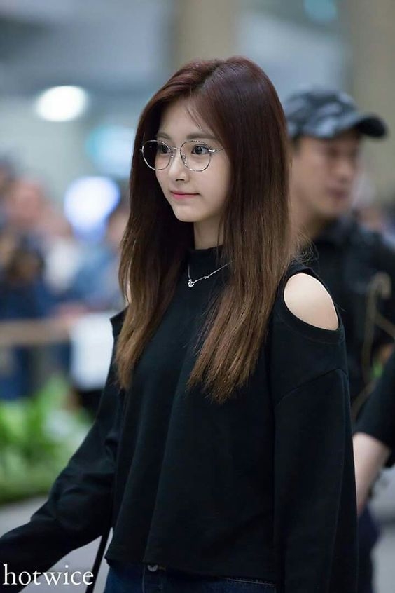 11002